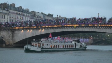 2024-paris-olympics-dispatch:-scenes-from-the-seine-as-the-opening-ceremony-wows-soaked-crowds