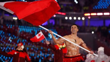 tonga-olympic-flag-bearer-pita-taufatofua-abandons-shirtless-look-for-paris-opening-ceremony
