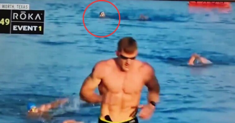 swimmer-disappears-under-the-water-feet-from-the-finish-line-–-all-competition-events-suspended