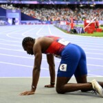 olympic-sprinter-noah-lyles-collapses,-put-in-a-wheelchair-after-medal-winning-performance