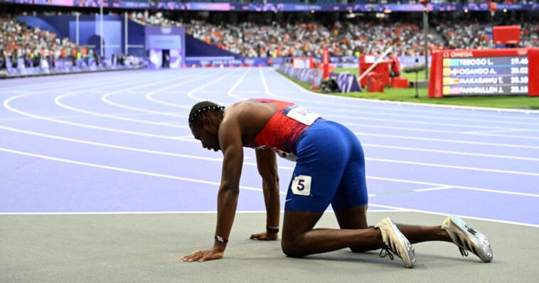 olympic-sprinter-noah-lyles-collapses,-put-in-a-wheelchair-after-medal-winning-performance