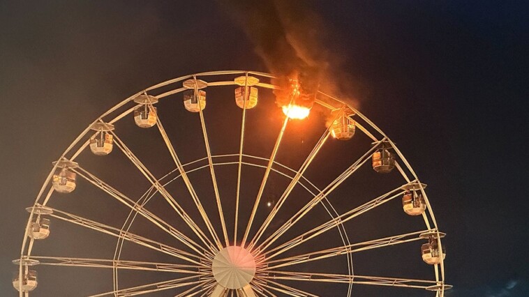 sky-high-horror-caught-on-video-as-ferris-wheel-catches-fire-during-music-festival