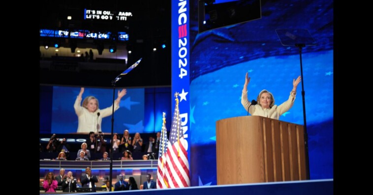 watch:-hillary-clinton-displays-sinister-smile,-nods-in-agreement-as-dnc-crowd-screams-chant-targeting-trump