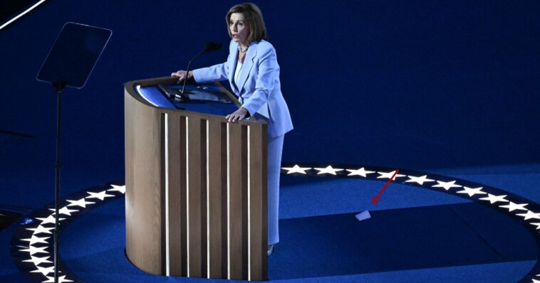 sharp-eyed-viewers-notice-object-fall-from-nancy-pelosi-as-she-walks-to-dnc-podium