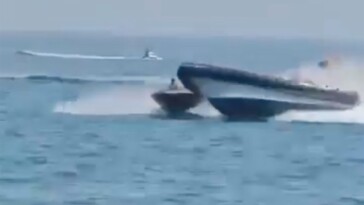 shocking-video-shows-police-boat-crashing-over-inflatable-boat-carrying-migrants