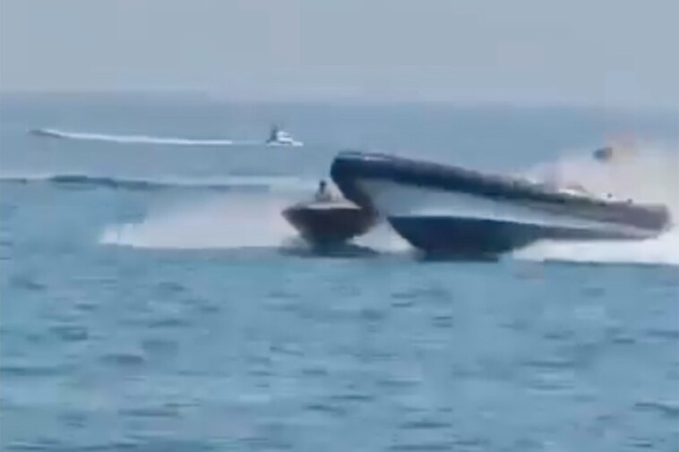 shocking-video-shows-police-boat-crashing-over-inflatable-boat-carrying-migrants