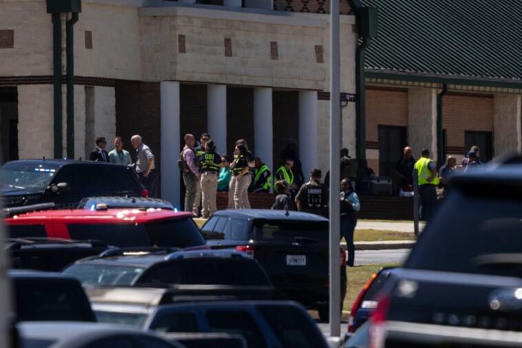 alleged-mass-shooter-colt-gray,-14,-left-class,-asked-to-be-let-back-in-locked-room-before-opening-fire-in-georgia-high-school-massacre:-student