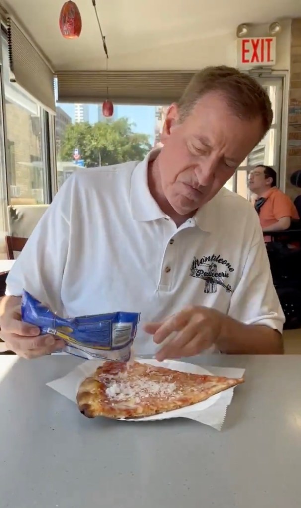 bill-de-blasio-sprinkles-coconut-on-pizza,-eats-it-crust-first-in-bizarre-stunt-to-promote-kamala-harris