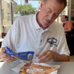 bill-de-blasio-sprinkles-coconut-on-pizza,-eats-it-crust-first-in-bizarre-stunt-to-promote-kamala-harris