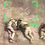 russians-appear-to-gun-down-surrendering-ukrainian-soldiers,-disturbing-drone-footage-shows