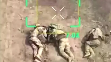 russians-appear-to-gun-down-surrendering-ukrainian-soldiers,-disturbing-drone-footage-shows