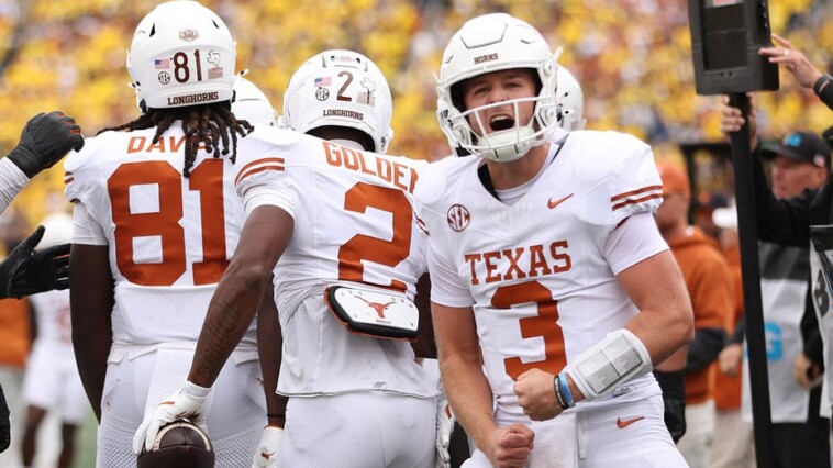 quinn-ewers-puts-on-stellar-display,-throws-3-touchdown-passes-as-texas-routs-michigan