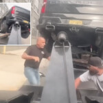 wild-video-shows-furious-driver-speed-off-in-stolen-tow-truck-—-with-his-vehicle-attached-—-while-unleashing-mayhem-down-street