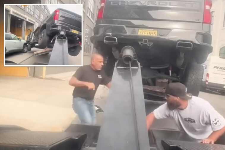 wild-video-shows-furious-driver-speed-off-in-stolen-tow-truck-—-with-his-vehicle-attached-—-while-unleashing-mayhem-down-street