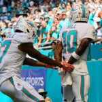 dolphins’-tyreek-hill-pokes-fun-at-police-detention-in-touchdown-celebration