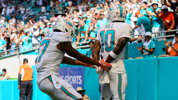 dolphins’-tyreek-hill-pokes-fun-at-police-detention-in-touchdown-celebration