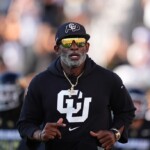 deion-sanders-denies-telling-colorado-band-not-to-play-fight-song-over-son-shedeur’s-music