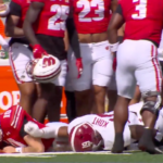 wisconsin-qb-tyler-van-dyke-carted-off-during-clash-with-alabama-in-injury-scare