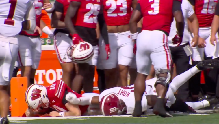 wisconsin-qb-tyler-van-dyke-carted-off-during-clash-with-alabama-in-injury-scare