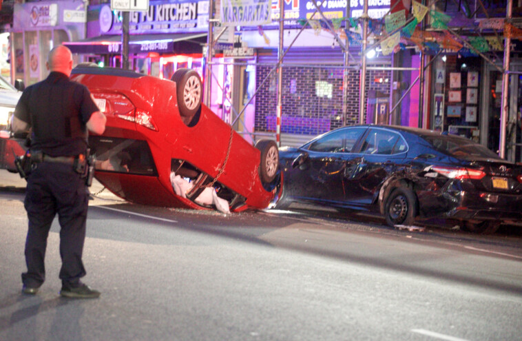 nyc-crash-leaves-two-injured,-one-car-overturned-in-midtown