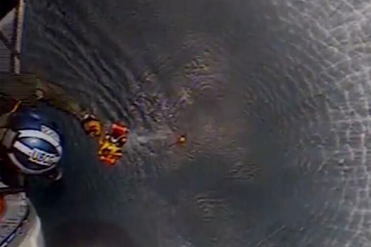 us-coast-guard-plucks-stranded-boater-from-the-high-seas-in-dramatic-video