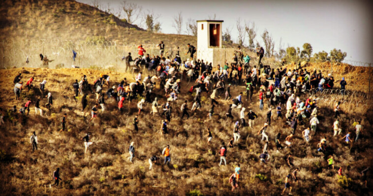 shock-video:-hundreds-of-african-men-try-to-storm-the-border-between-morocco-and-the-spanish-enclave-of-ceuta