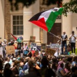 anti-israel-agitators-rock-university-of-north-carolina,-vandalize-building-and-remove-american-flag