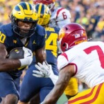 u-m-runs-down-usc,-wins-with-32-passing-yards