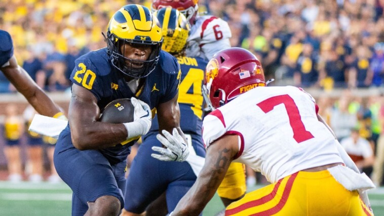 u-m-runs-down-usc,-wins-with-32-passing-yards