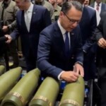 ‘trump-will-start-world-war-iii,’-says-party-autographing-bombs-to-be-launched-at-russia