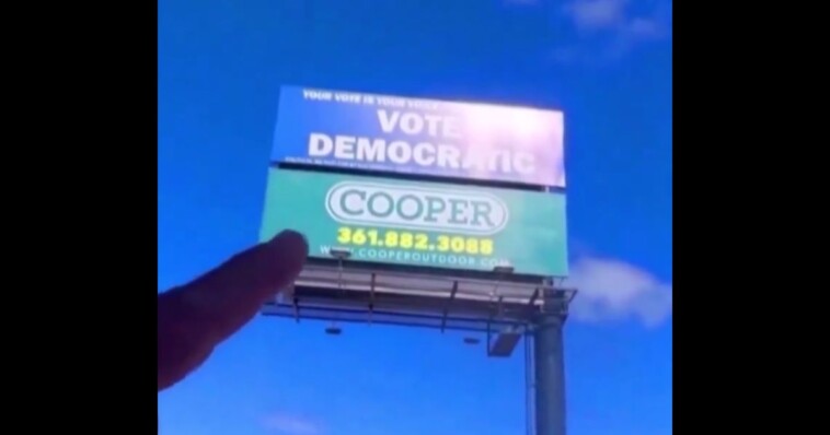 gun-coating-company-takes-action-when-‘vote-democratic’-billboard-appears-above-shop