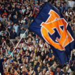 auburn-cheerleader-welcomes-oklahoma-with-wild-backflip-kick-to-player’s-helmet