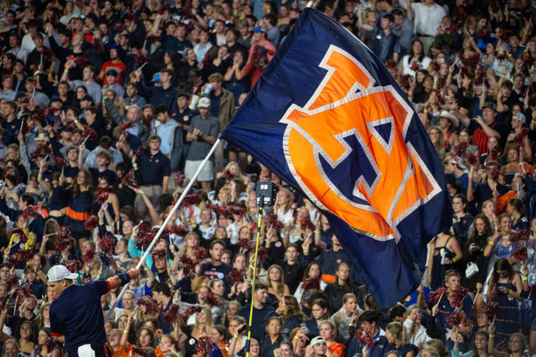 auburn-cheerleader-welcomes-oklahoma-with-wild-backflip-kick-to-player’s-helmet