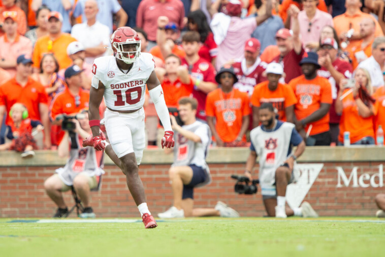 no.-21-oklahoma-gets-pick-6-from-kip-lewis-to-finish-comeback-win-over-auburn