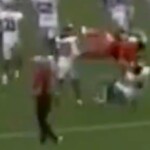 auburn-cheerleader-wipes-out-oklahoma-player-with-wild-backflip