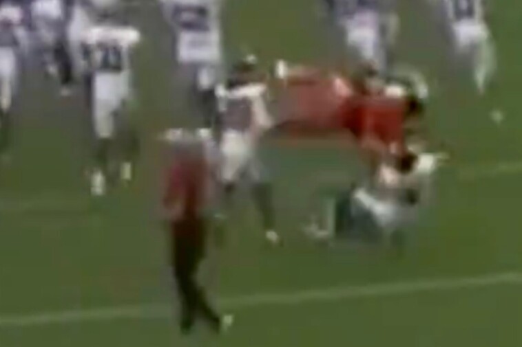 auburn-cheerleader-wipes-out-oklahoma-player-with-wild-backflip