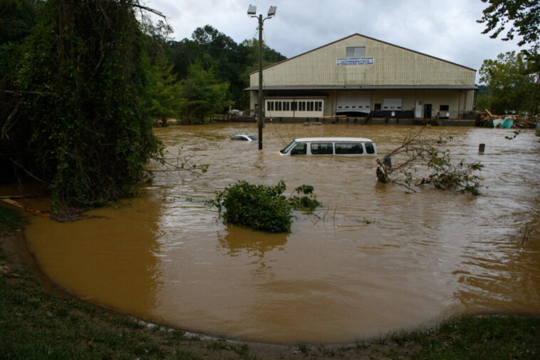 ‘devastating-flooding’-from-helene-besets-north-carolina’s-asheville,-local-death-toll-reaches-30