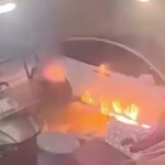 electric-time-bomb:-tesla-bursts-into-flames-inside-garage-flooded-by-hurricane-helene