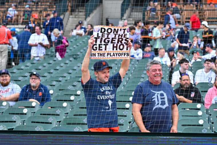 detroit-tigers-celebrate-making-playoffs-with-classy-move:-invite-superfan-to-join-team-photo