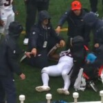 nfl-running-back-collapses-on-sideline,-carted-away-on-a-stretcher