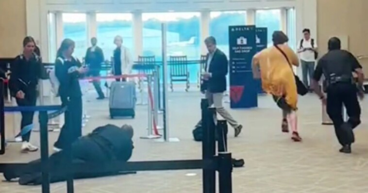 unhinged-delta-airport-customer-goes-on-a-rampage,-screams-‘i-will-kill-you’-at-cops-in-viral-video