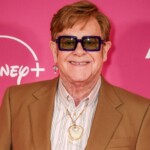 elton-john-wears-his-old-kneecap-as-a-pendant-around-his-neck-following-latest-health-scare