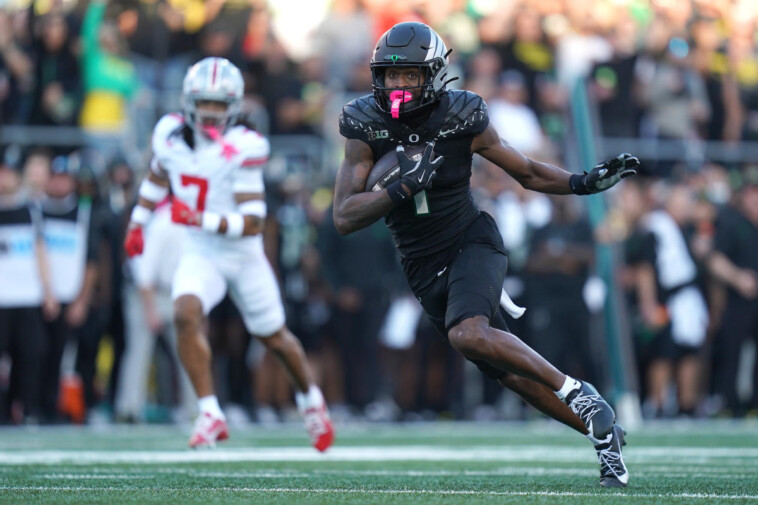 oregon-wr-traeshon-holden-ejected-for-spitting-on-ohio-state-player