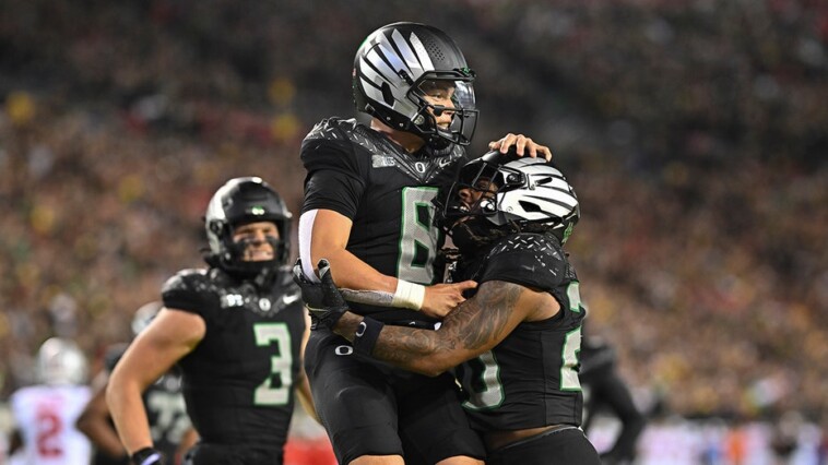 oregon-holds-off-ohio-state’s-final-second-comeback-in-epic-battle-of-top-three-big-ten-programs