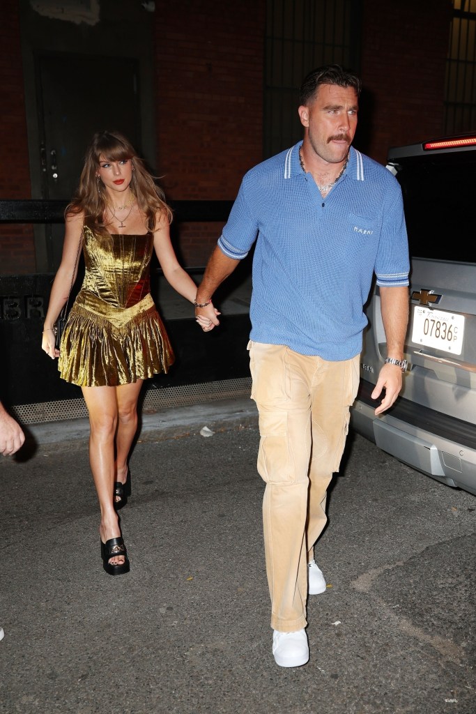 taylor-swift-and-travis-kelce-hold-hands-during-date-night-on-chiefs’-bye-week