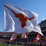 texas-football-stars-plant-flag-through-baker-mayfield-jersey-after-win-over-oklahoma