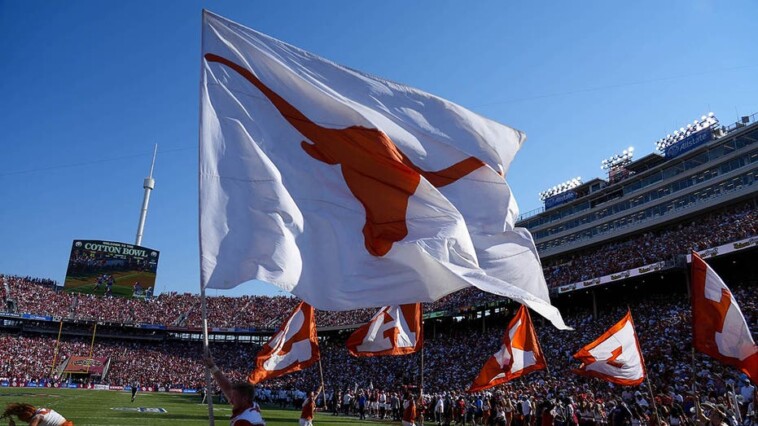 texas-football-stars-plant-flag-through-baker-mayfield-jersey-after-win-over-oklahoma