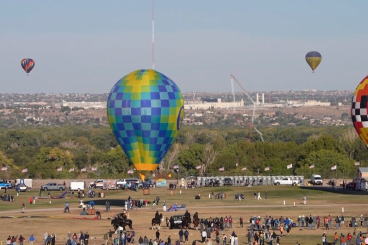 hot-air-balloon-hits-power-line-and-catches-on-fire-at-new-mexico-festival