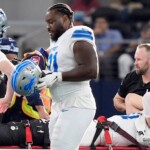 lions’-aidan-hutchinson-suffers-gruesome-injury-vs-cowboys,-leaves-game-on-backboard