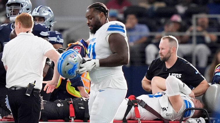 lions’-aidan-hutchinson-suffers-gruesome-injury-vs-cowboys,-leaves-game-on-backboard